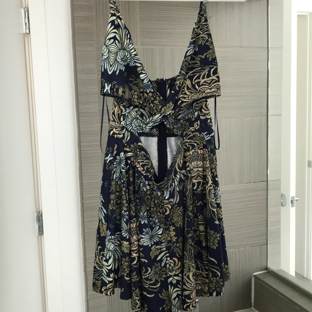 Boutique cute romper criss cross cut out